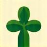 Groen gekleurd icoon dat een bladvormig kruis voorstelt, symbool voor veganisme.